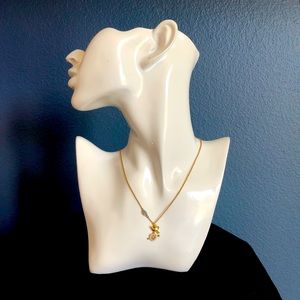 Juicy Couture bird and peace sign necklace